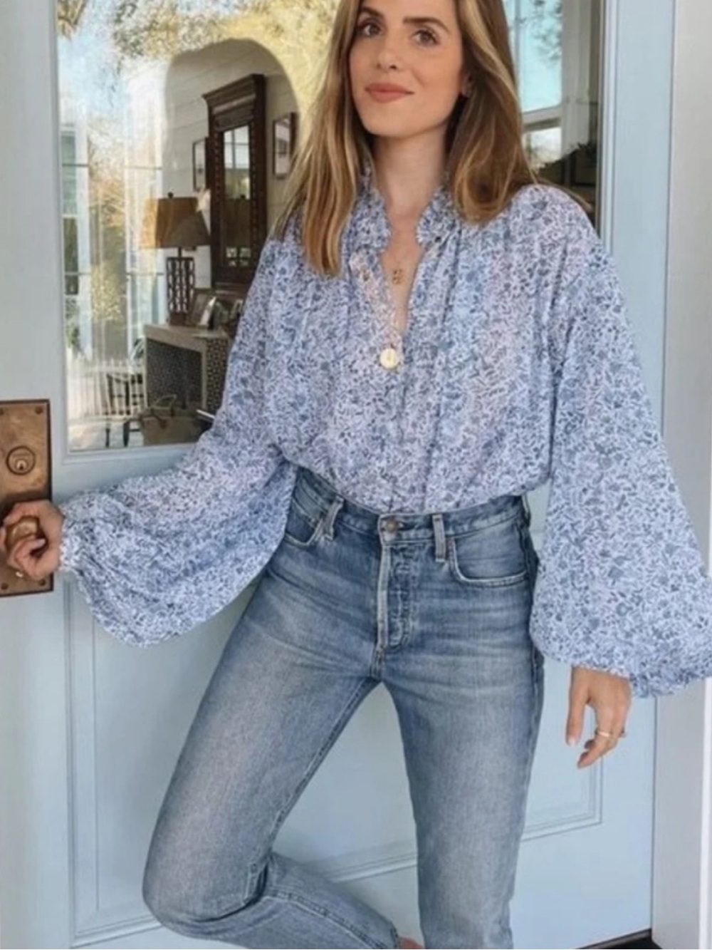 Thierry Colson floral print blouse features a mock neck and voluminous long